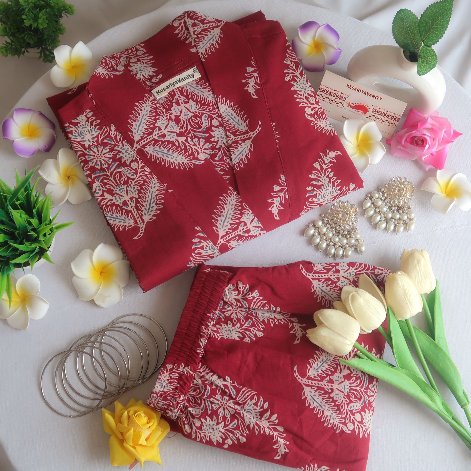 IMG-20240531-WA0043_27e071af-e87f-4e1c-8567-95eb58f3f390.jpg Soothing Rosewood Delight V-Neck Suit Set - Image 1