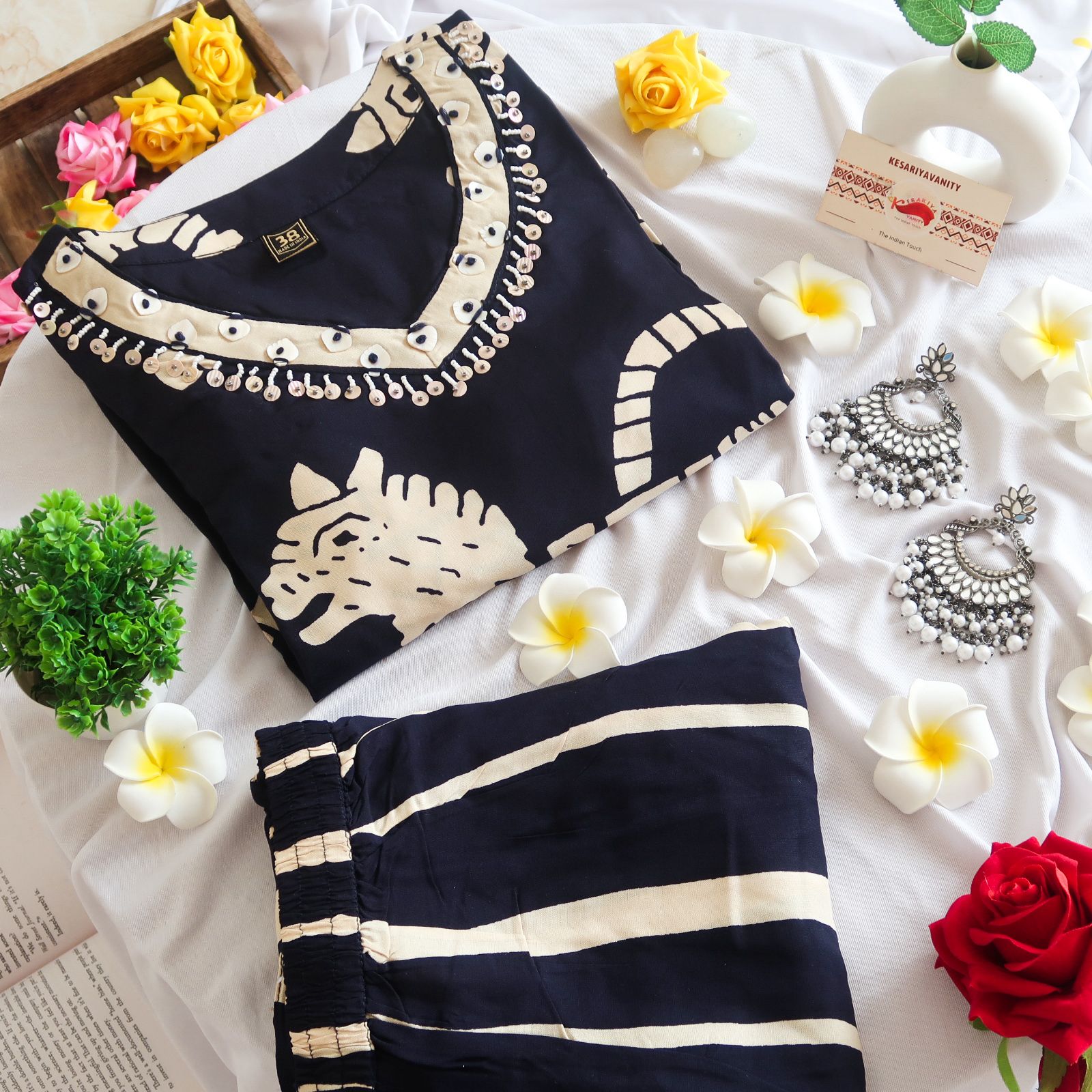 WhatsAppImage2023-11-25at12.31.37_905f0445_6c1fea8d-f618-4ff6-9495-010672a120ba.jpg Dark Majesty Tiger Print Suit Set - Image 1